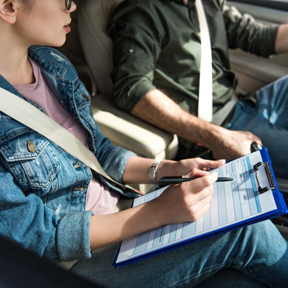 student-and-teacher-in-car-at-dri-FUHBPMU.jpg